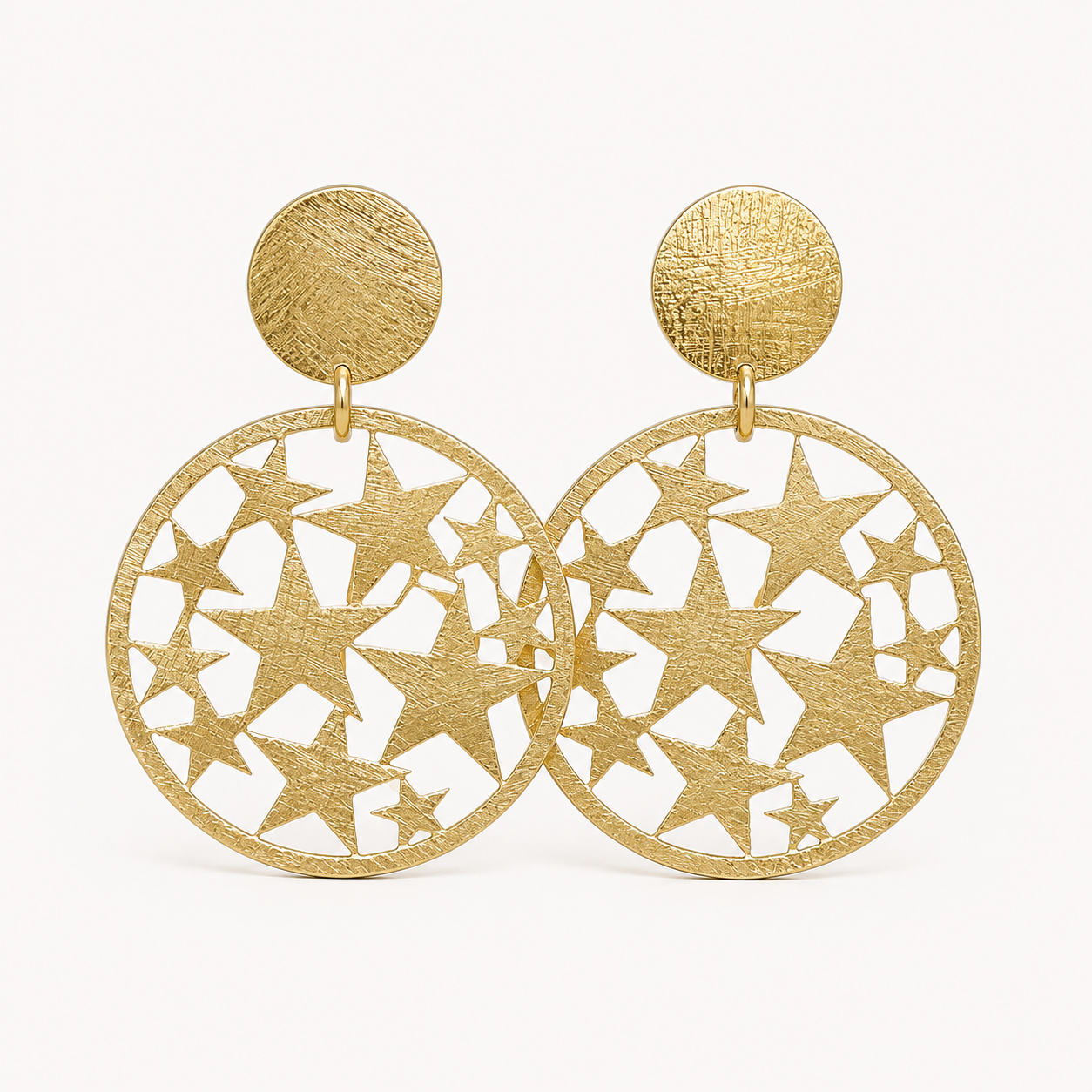 Aros estrellas caladas gold