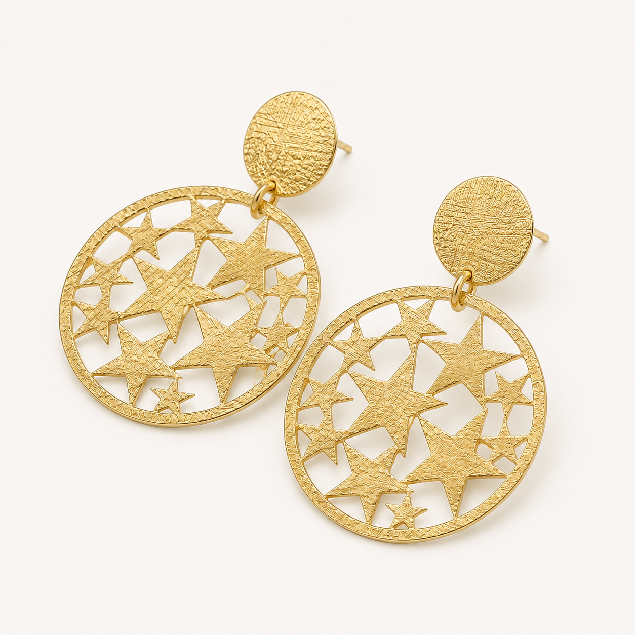 Aros estrellas caladas gold1