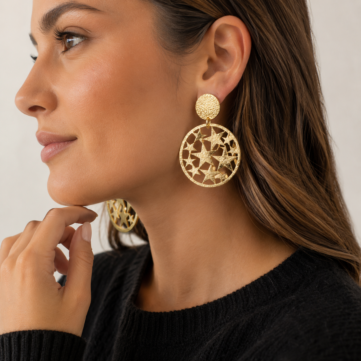 Aros estrellas caladas gold puestos