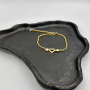 PULSERA cadenita rolo, circones y corazón&nbsp;calado al centro